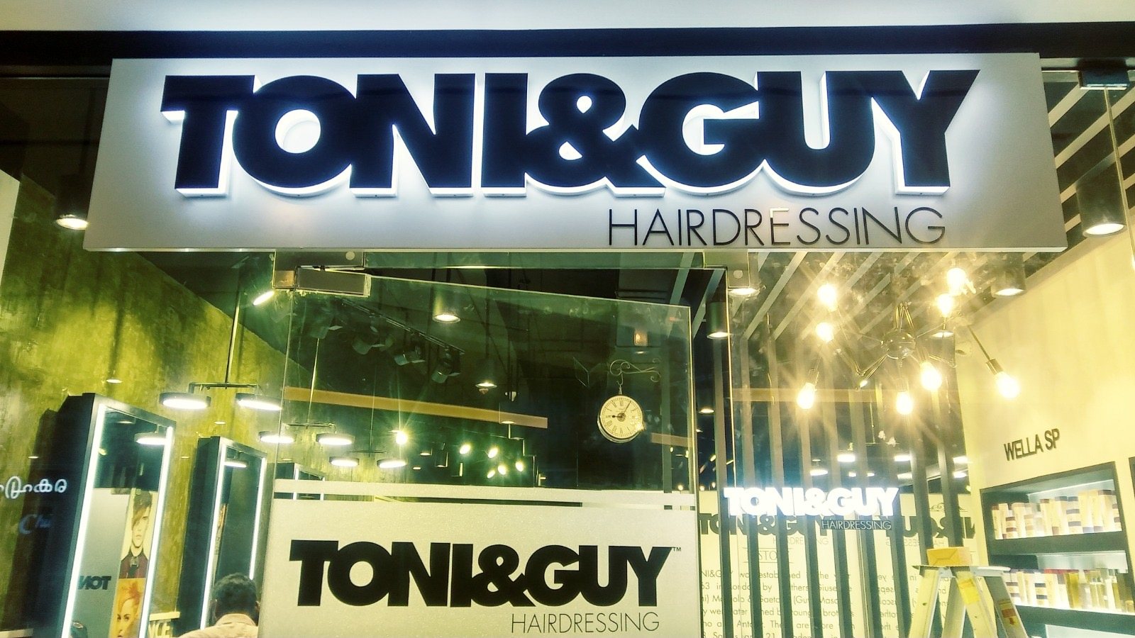 Toni and Guy storefront with illuminated signage